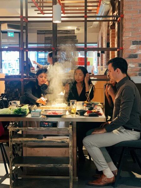 group meal with hotpot